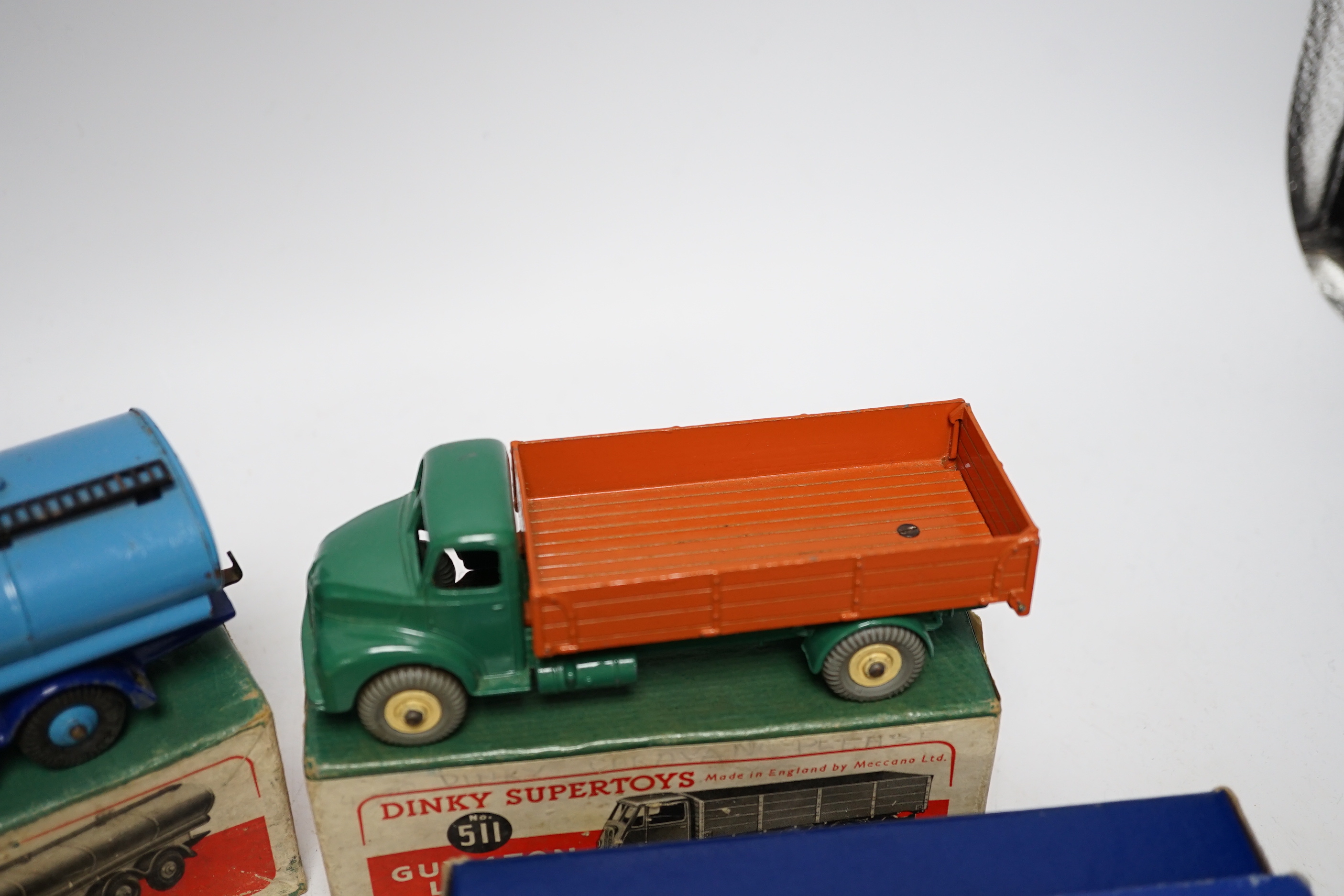 Three boxed Dinky Supertoys; (514) a Guy Slumberland Van, (504) a Foden 14 ton Tanker, and a (532) Comet Wagon with hinged tailboard, together with two useful empty boxes for a second Comet Wagon (418) and a Guy 4 ton Lo